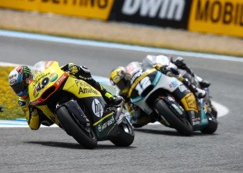 Rins goes to the ground in the fight for second place in Jerez