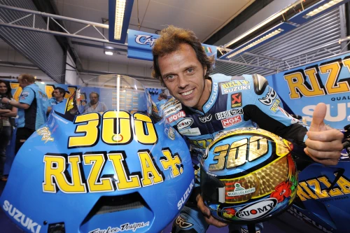 Capirossi battles to ninth in Qatar thriller